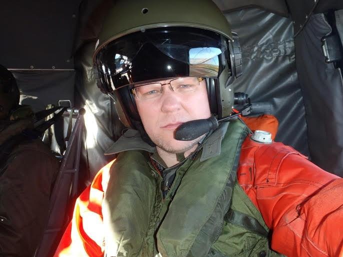 Rowan Byrne in helicopter survey gear during Falkland Islands environmental work in 2008